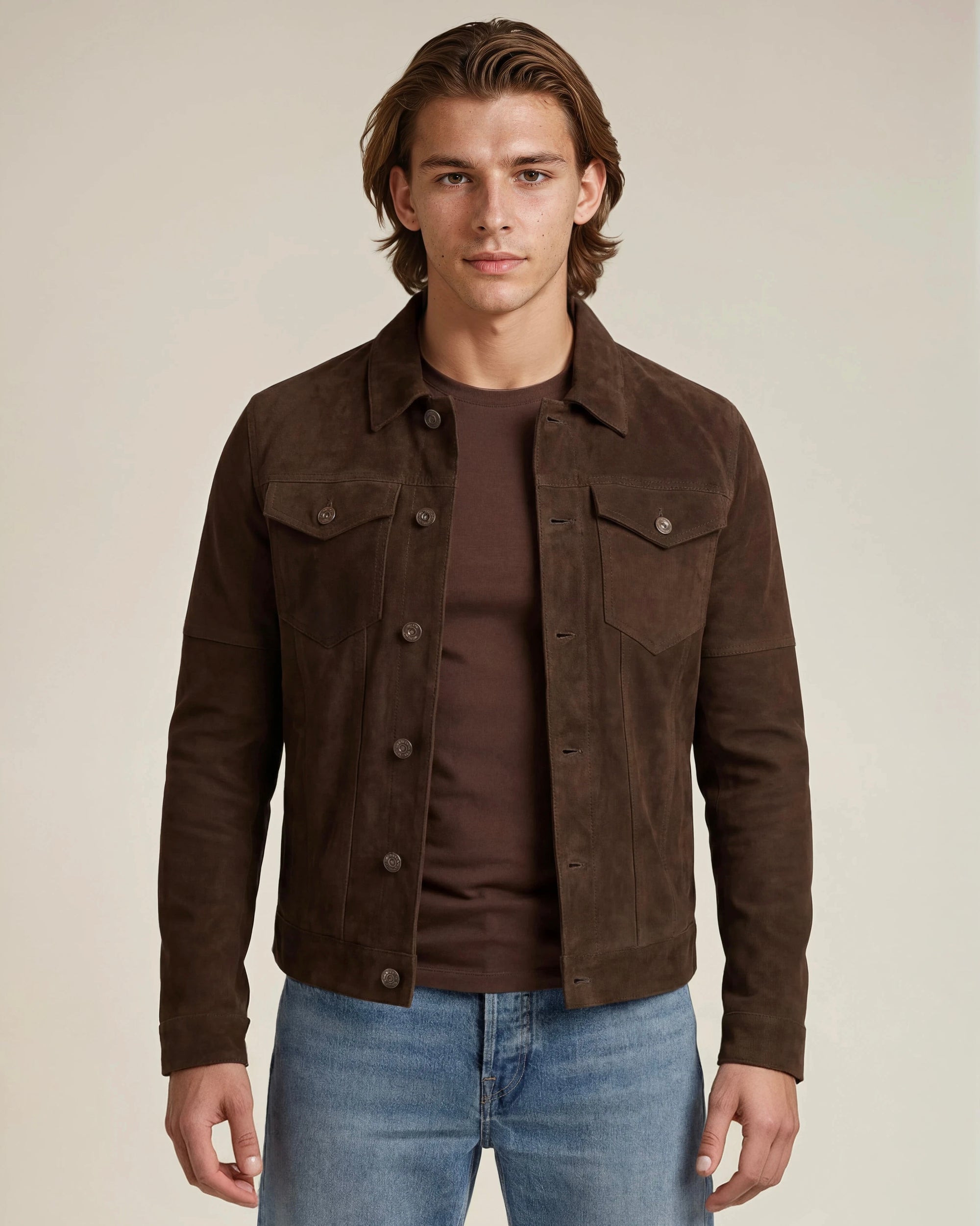 Western cowboy man wearing a dark brown goat suede trucker jean jacket